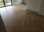 Engineered oak large parquet block wood flooring installed over underfloor heating