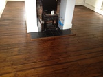 Pine planks Sanded and Stained dark in a cotage in Amesbury