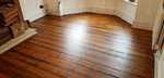 Sanding and dark stain floorboards in Warminster