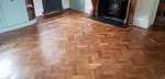 anding and finishing Teak herringbone parquet flooring in Lymington