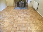 Beach block Parquet floor repairs, gap filling and re-finished in Ringwood.