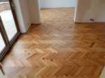Reclaimed pine herringbone flooring fitted and sanded by our craftsman
