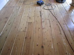 Floorboards using wood slivers for gap filling