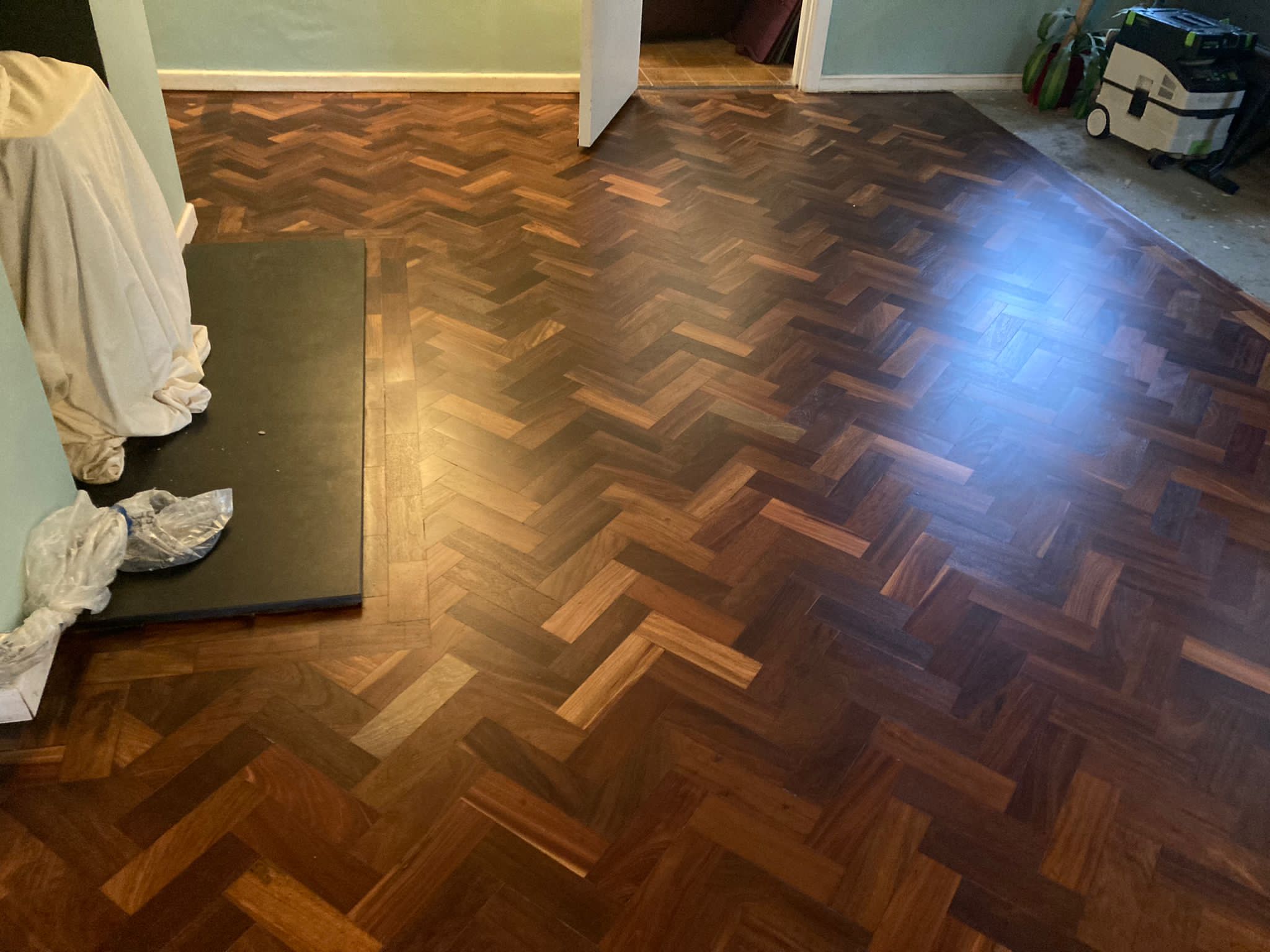 African Mahogany (Sapele) Herringbone Parquet Restoration, Andover