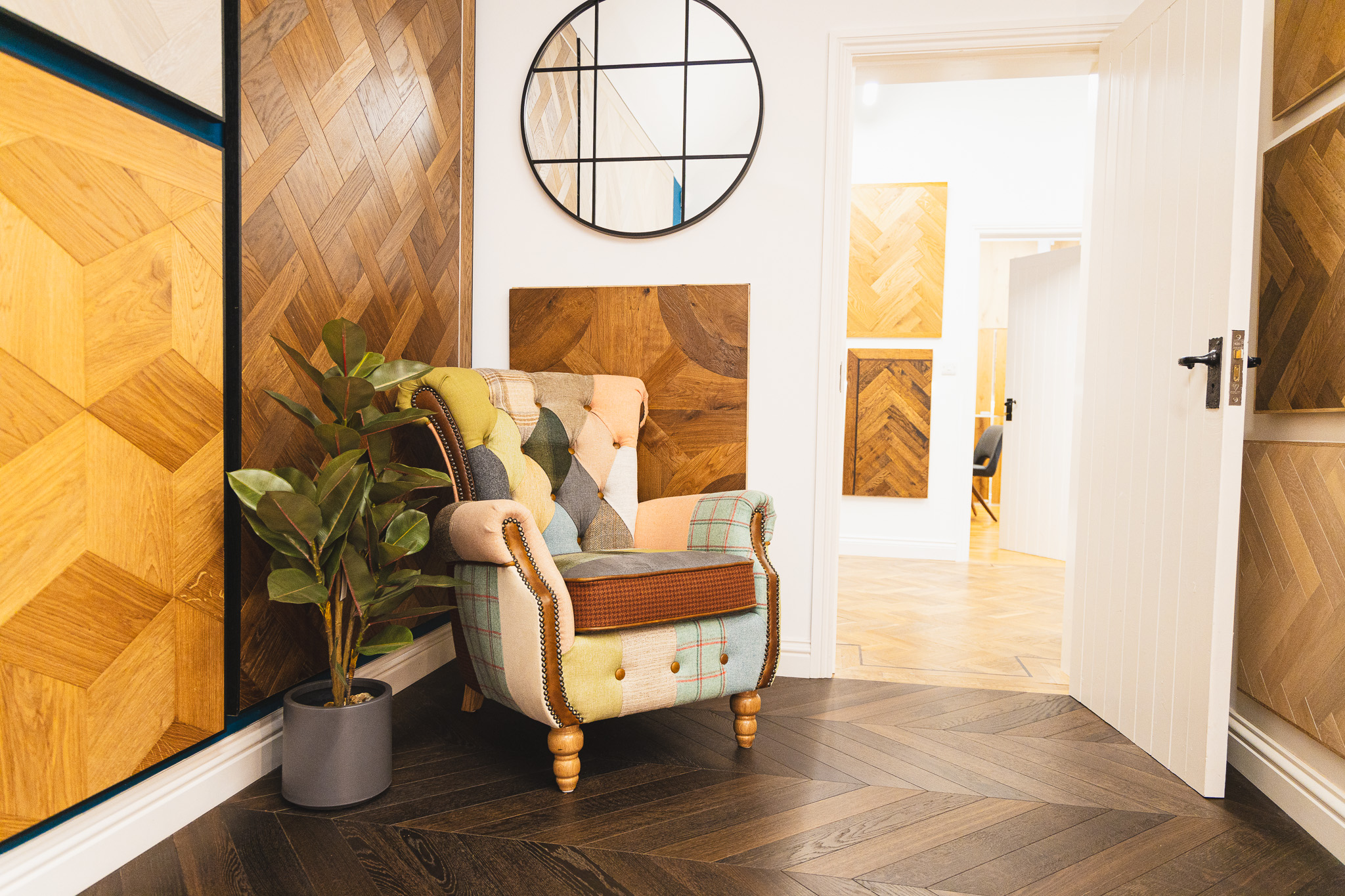 Wood floor showroom in salisbury with flooring samples and a comfy chair