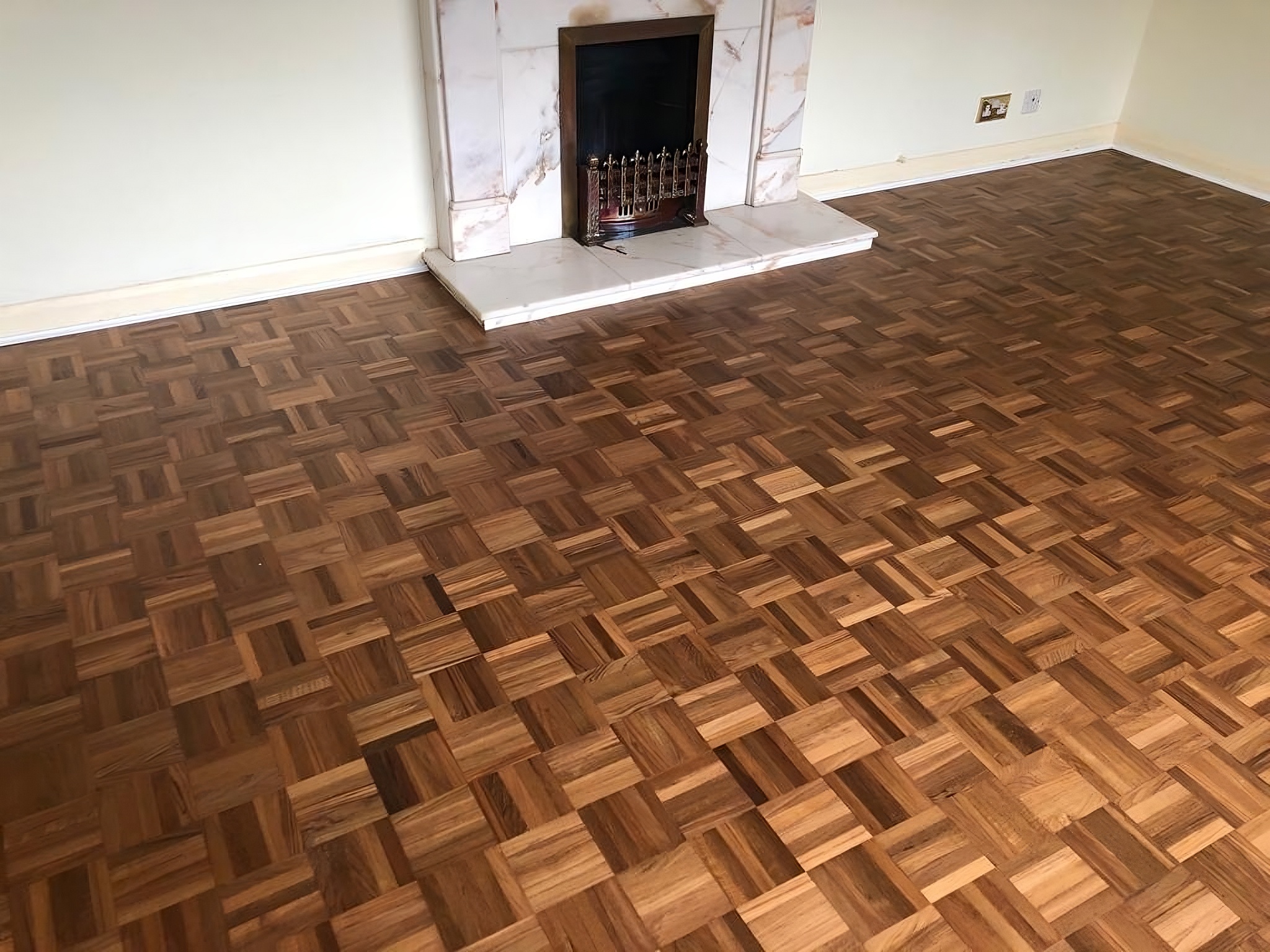 Teak Parquet mosaic wood flooring sanded and re-finished in Ringwood