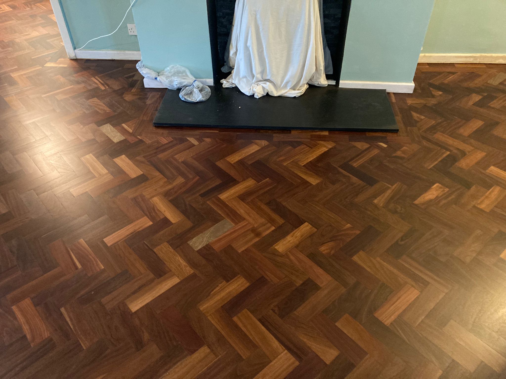 African Mahogany (Sapele) Herringbone Parquet Restoration, Andover