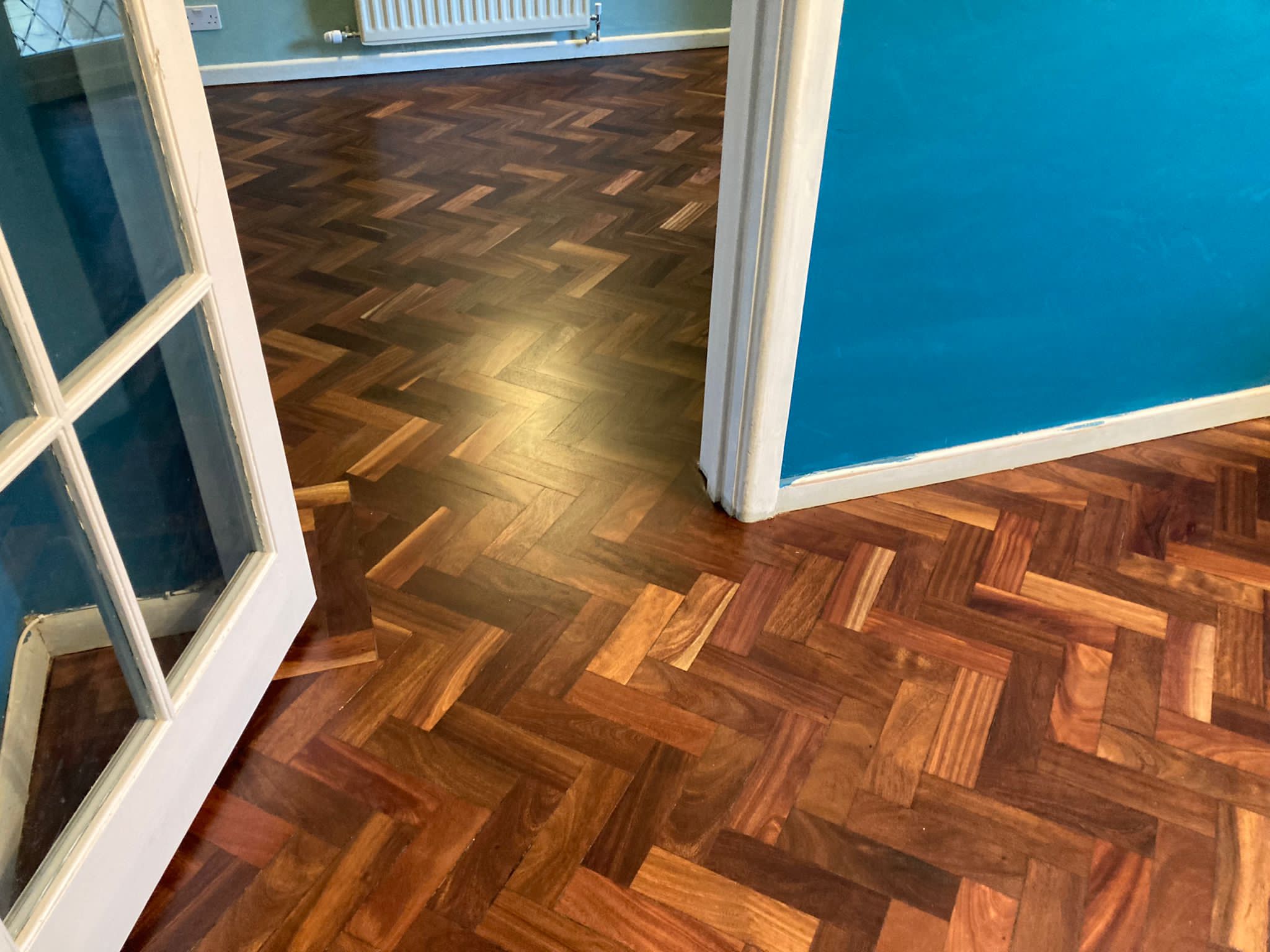 African Mahogany (Sapele) Herringbone Parquet Restoration, Andover