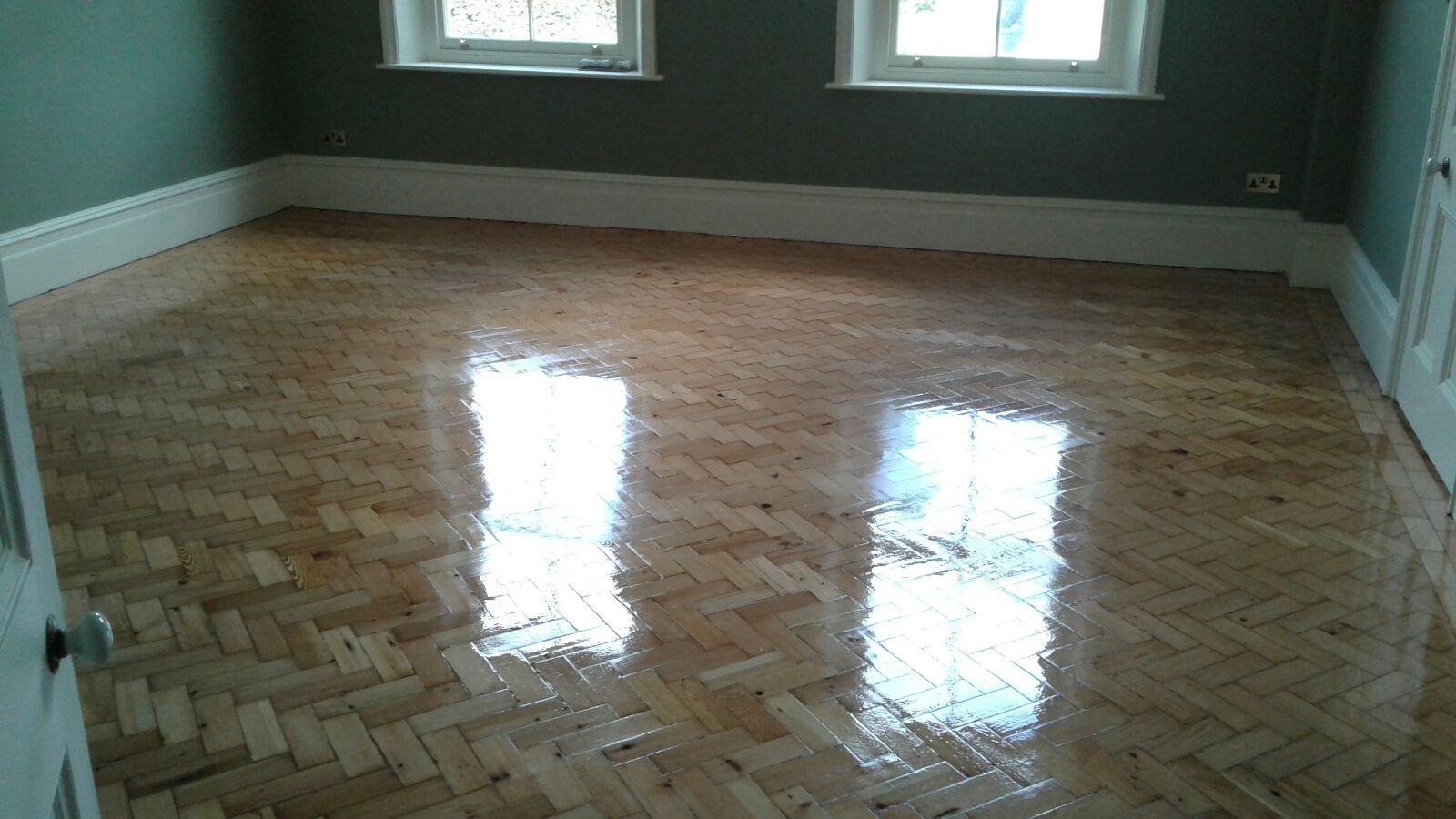 Reclaimed herringbone to match existing parquet pine installed sanded and repaired in Shaftesbury