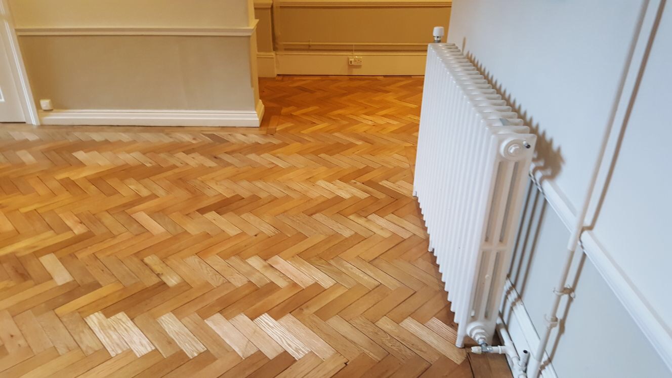 Old oak herringbone sanded and refinished in southampton