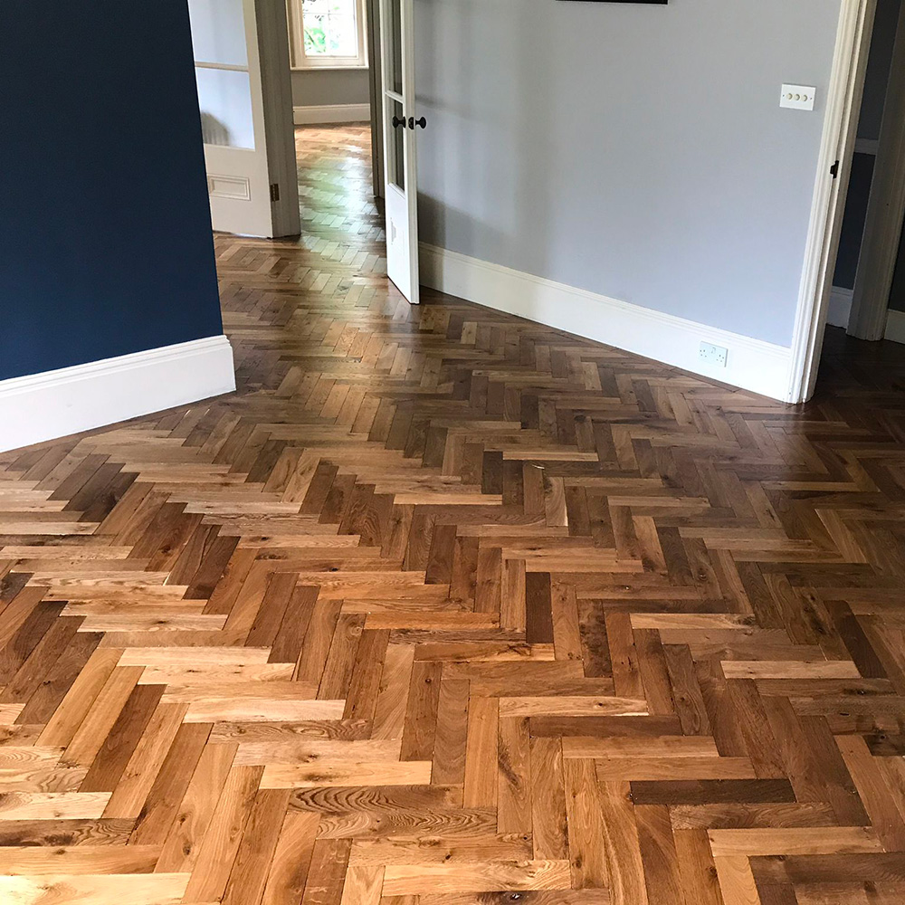 Dark toned distressed and tumbled wood flooring.
