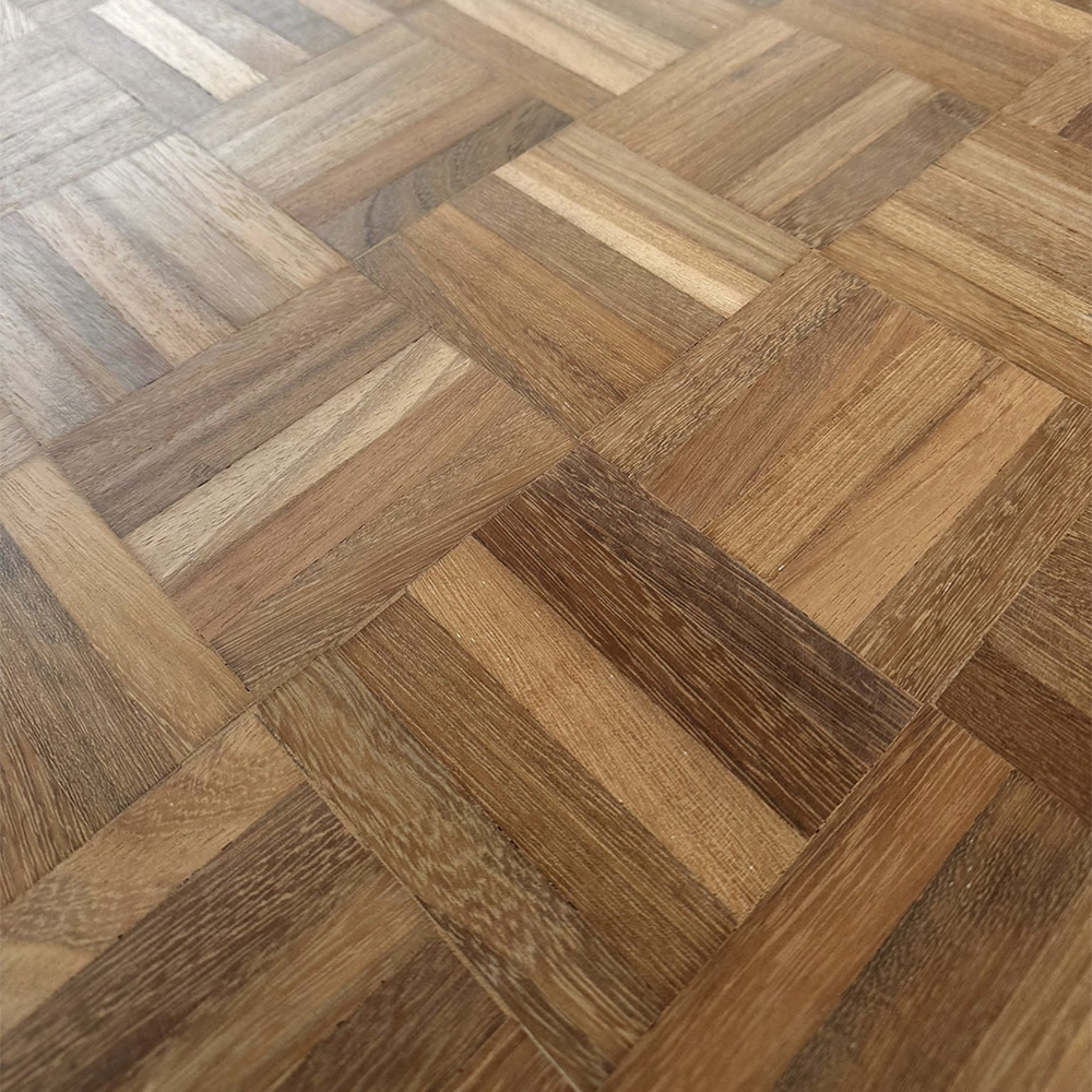 Before image of parquet finger style floor with gaps.