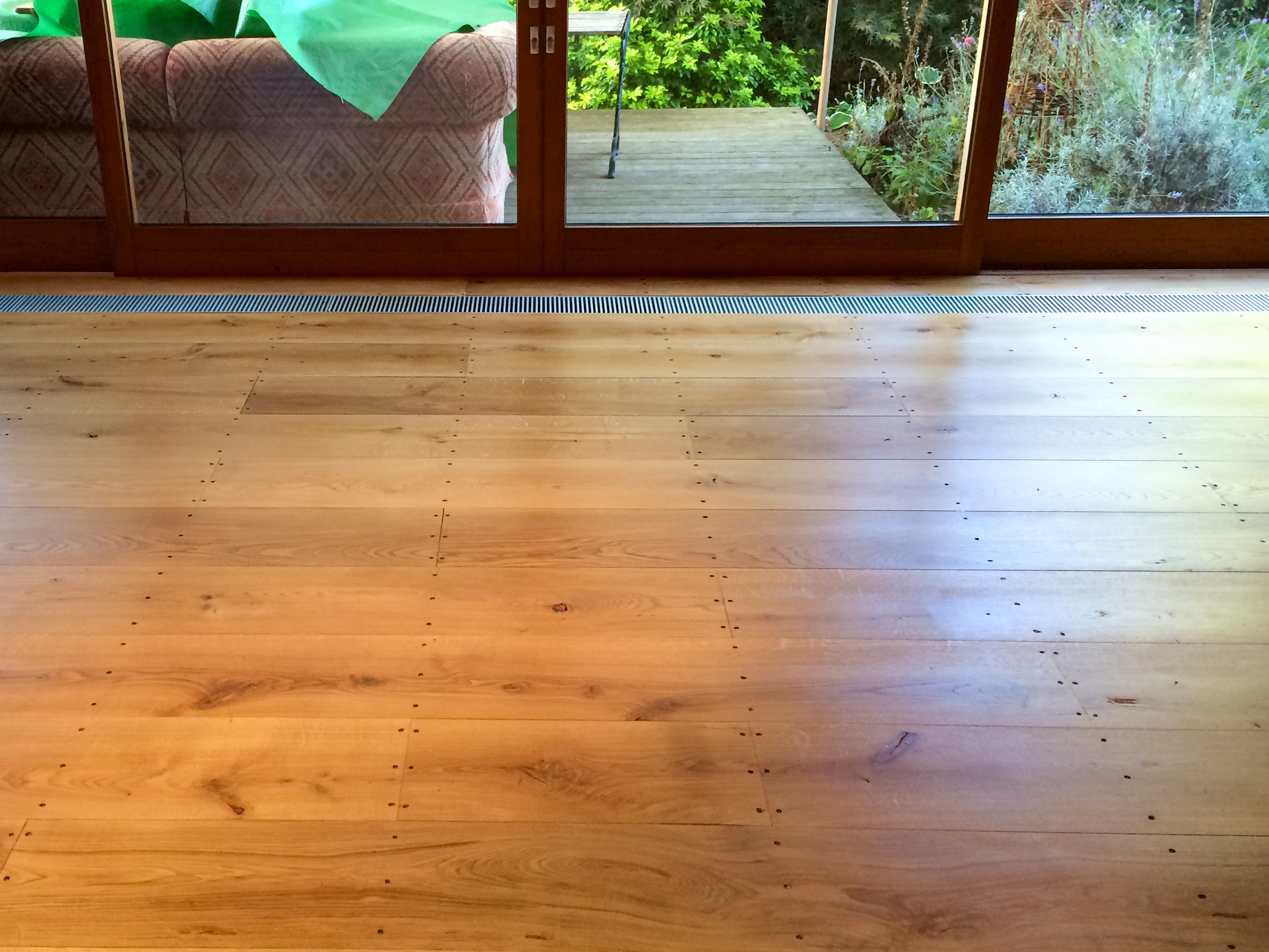Sanded and finished floorboards.