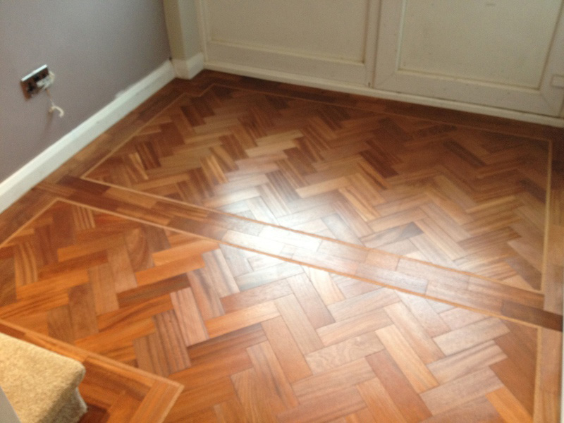 Parquet floor repair after with finish.