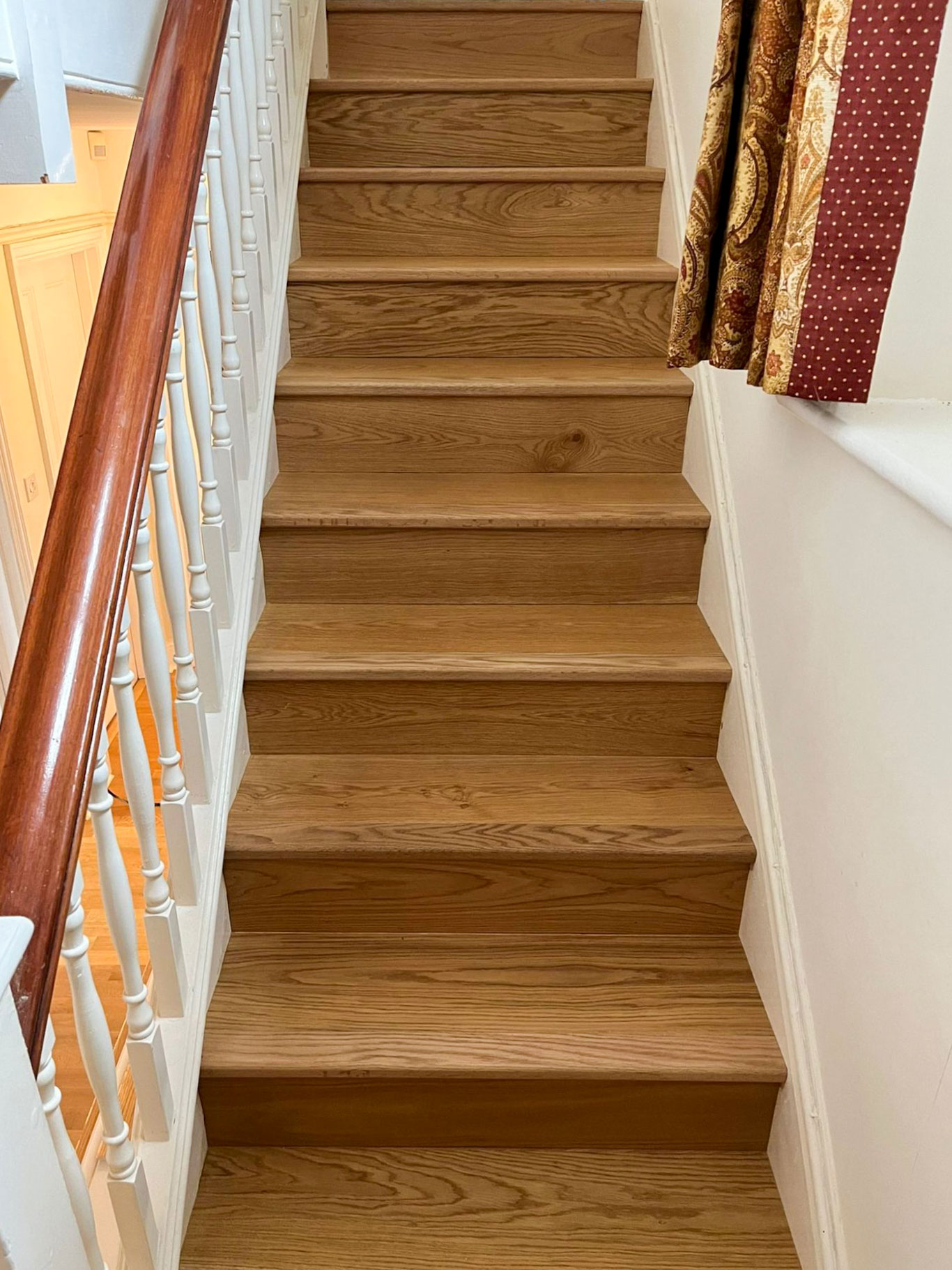 Stair cladding installed in home.