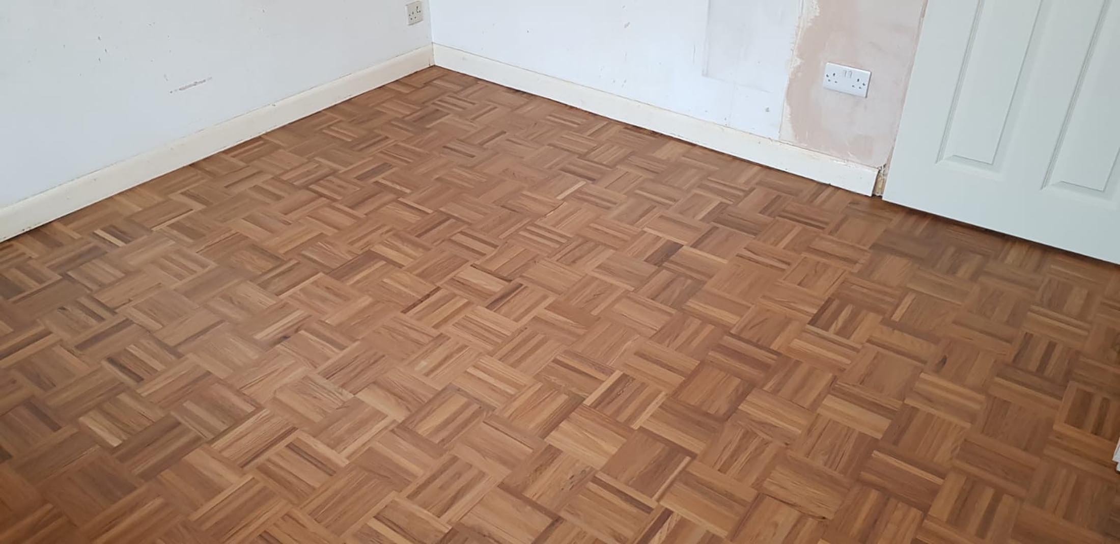 Sanding and sealing/restoration parquet mosaic including lots of repairs, finished with Bona Natural in Southampton