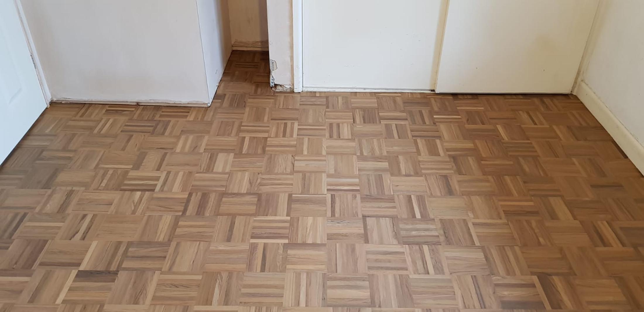 Sanding and sealing/restoration parquet mosaic including lots of repairs, finished with Bona Natural in Southampton