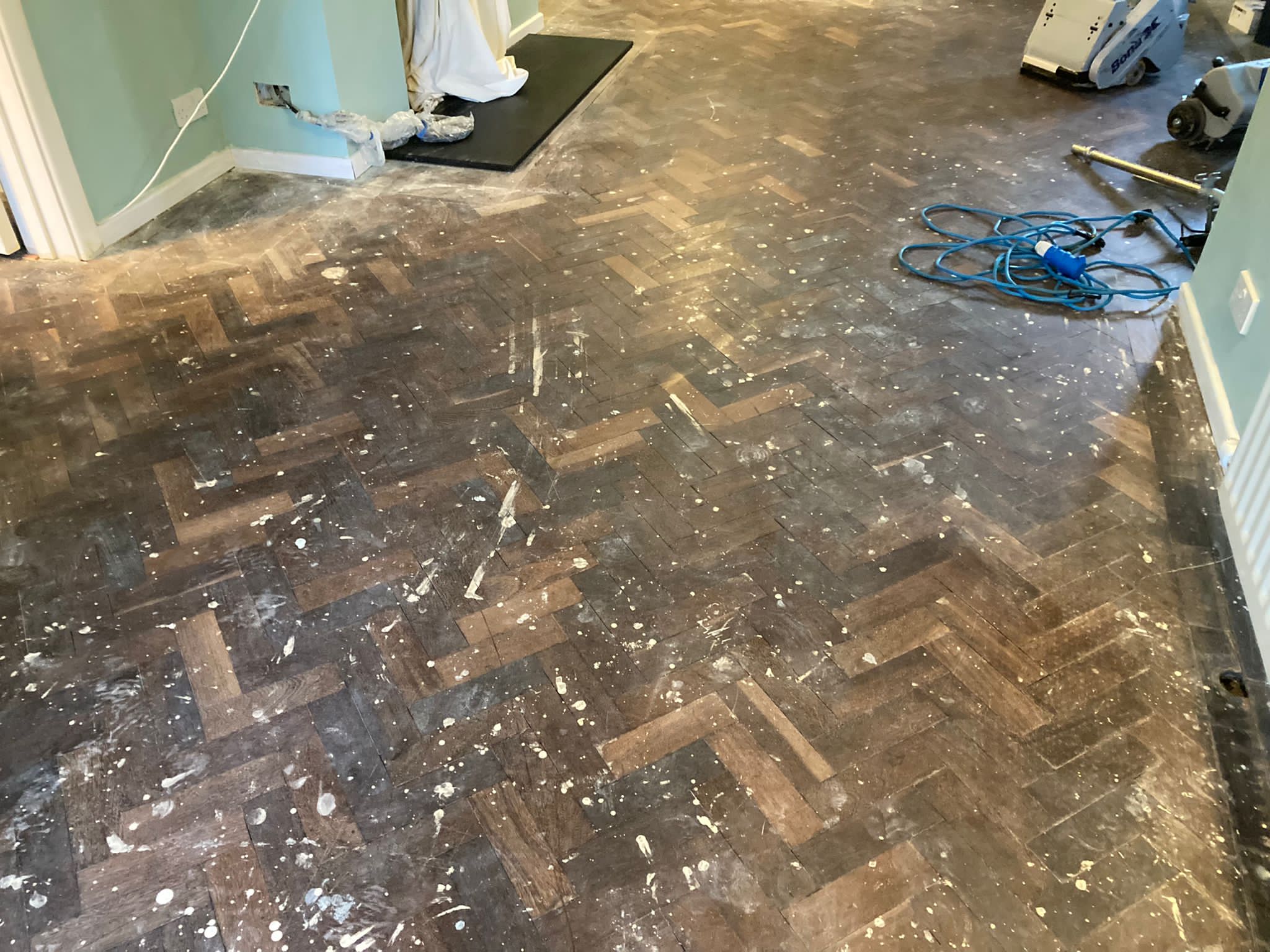 African Mahogany (Sapele) Herringbone Parquet Restoration, Andover