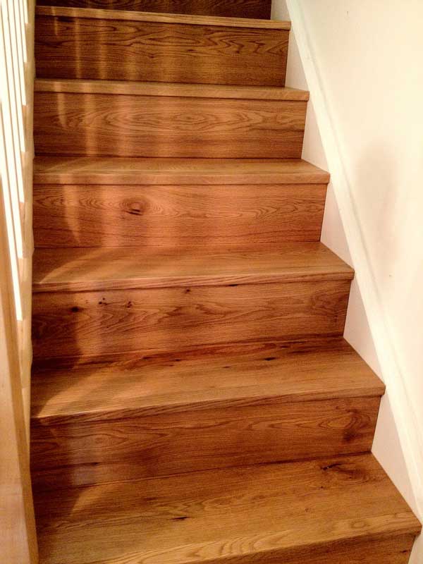 Stairs cladded with oak wood flooring in Wiltshire