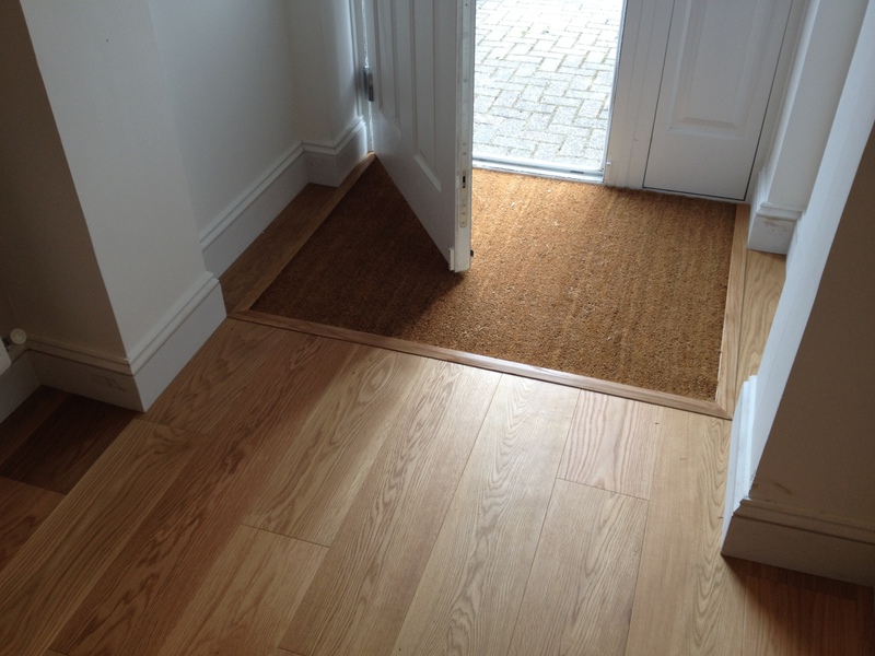 Engineered oak wood flooring with inset coir mat in Wilton, Salisbury
