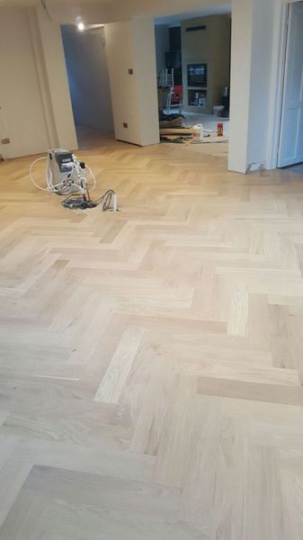 Engineered oak large parquet block wood flooring installed over underfloor heating
