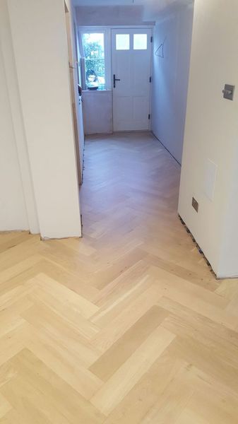 Engineered oak large parquet block wood flooring installed over underfloor heating