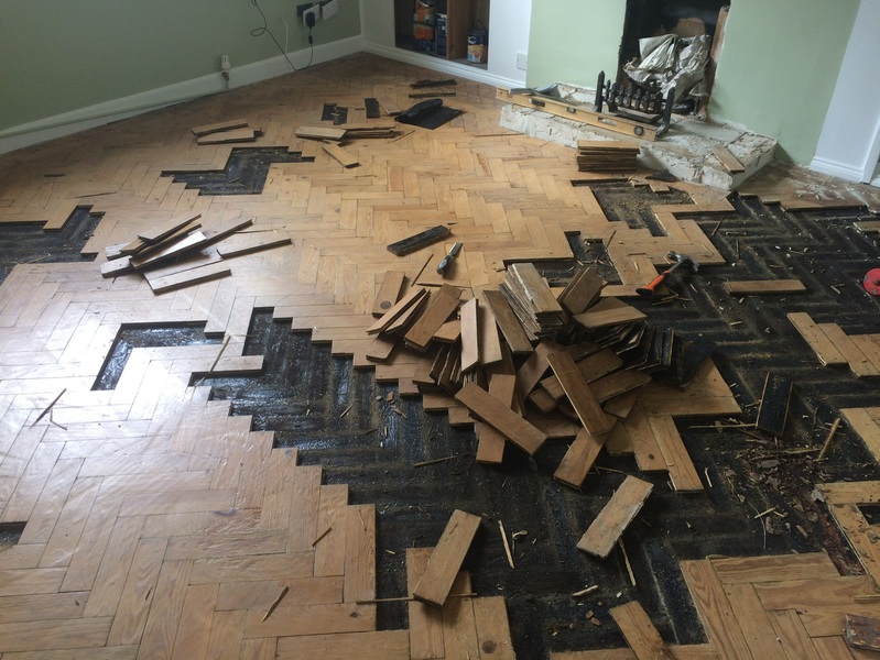 loose pine parquet blocks that needed to be re-stuck before sanding, sanded and finished with Bona Lacquer Ringwood