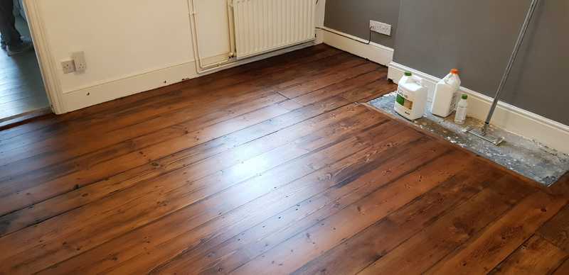 Sanding and staining pine floorboards in Warminster