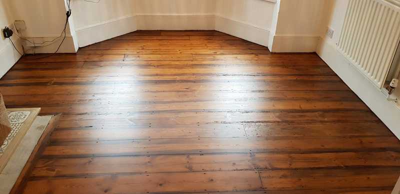 Sanding and staining pine floorboards in Warminster