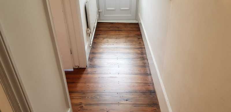 Sanding and staining pine floorboards in Warminster