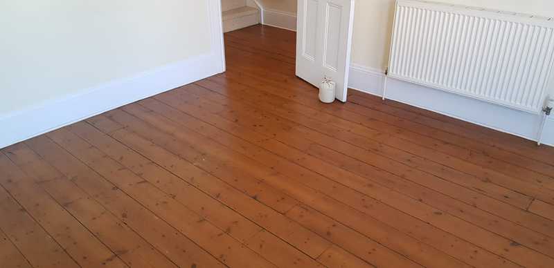 Sanding and sealing of stunning pine planks in southampton