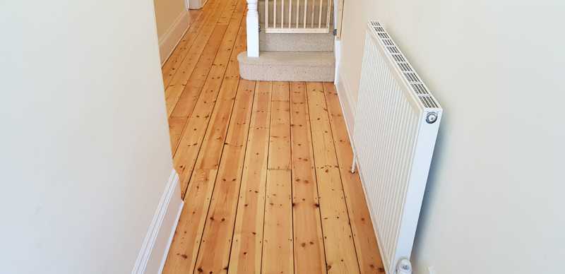 Sanding and sealing of stunning pine planks in southampton