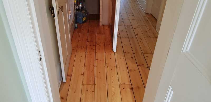 Sanding and sealing of stunning pine planks in southampton