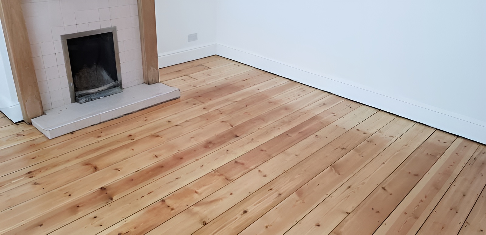 Pine floorboards sanded and sealed in Amesbury finished with Bona traffic lacquer