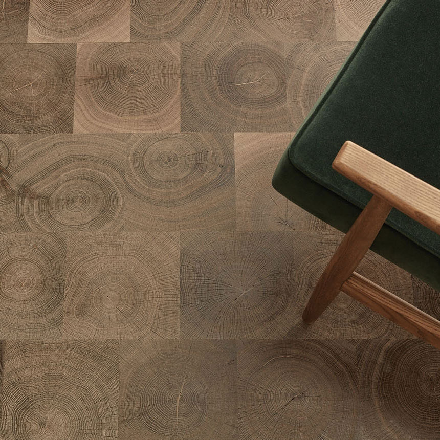 End grain plank flooring with chair in view.