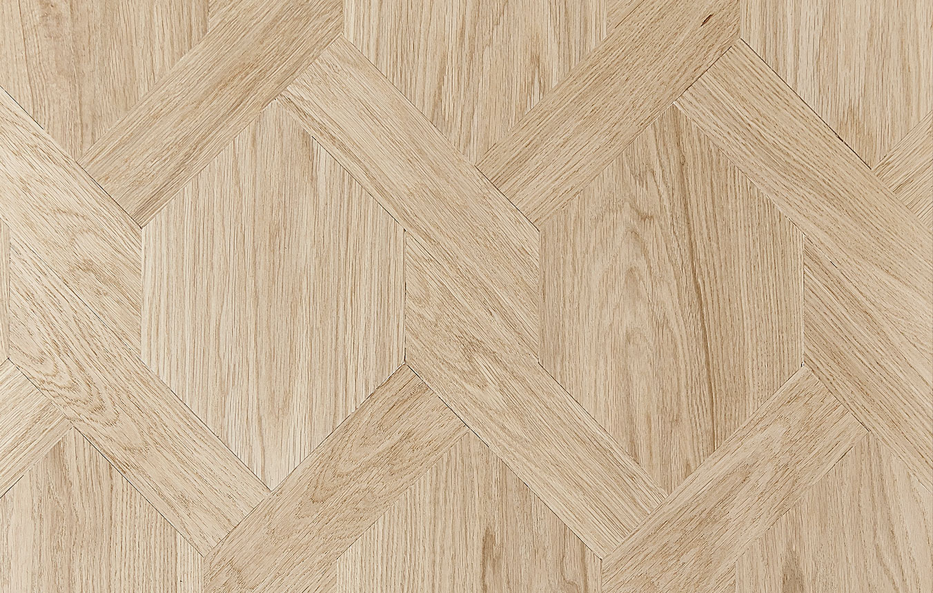 Maison weave wood floor pattern close up.