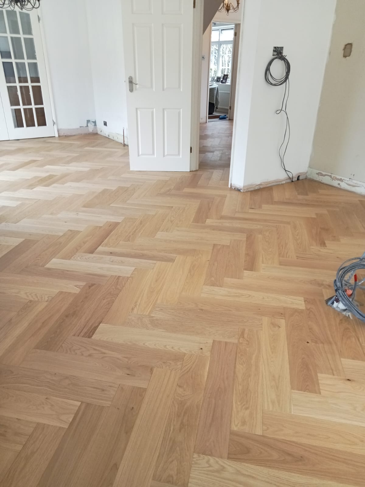 Large Prime Oak Herringbone Parquet Flooring Fitted, Pewsey