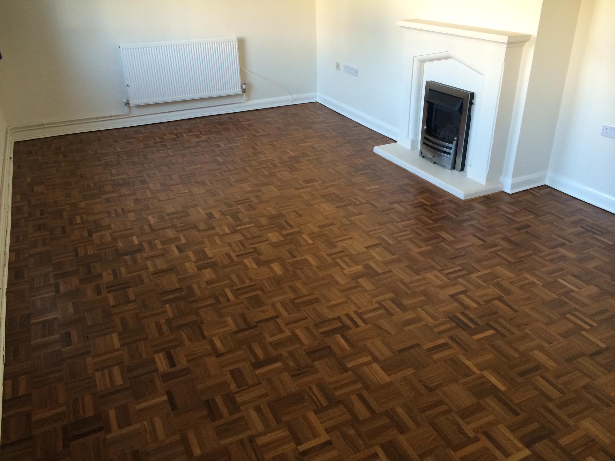 Finger parquet parkett wood floor sanded and filled finished with lacquer