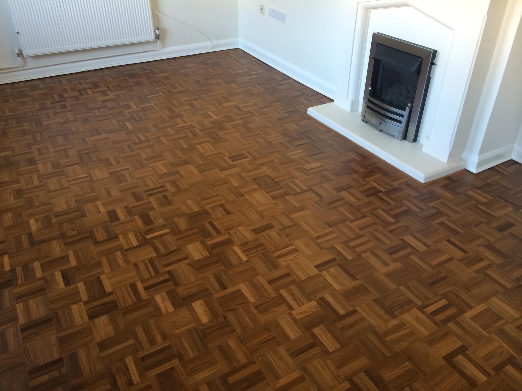 Finger parquet parkett wood floor sanded and filled finished with lacquer