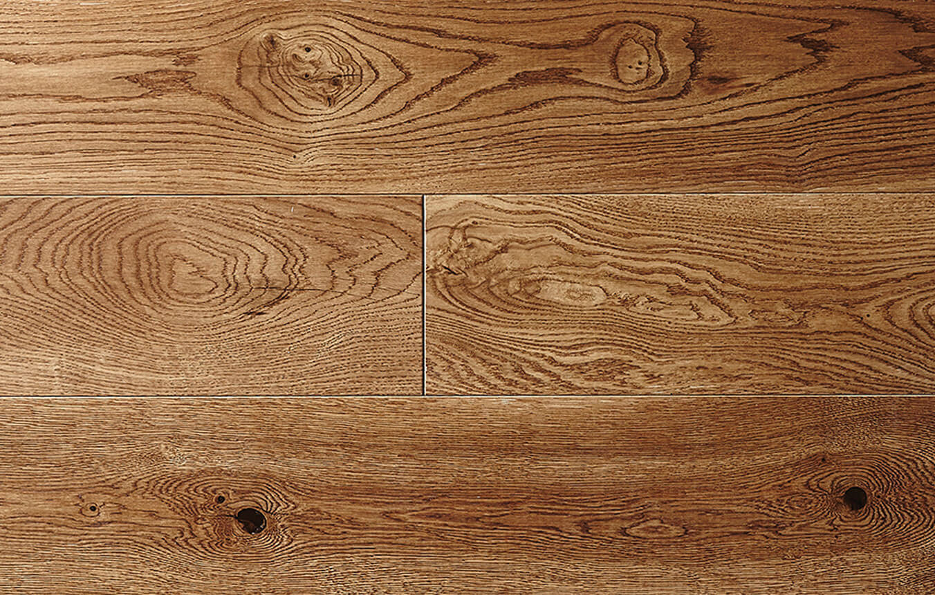 Close up of plank wood flooring.