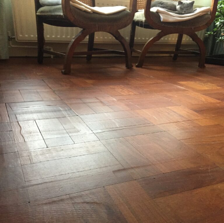Poorly sanded parquet floor.